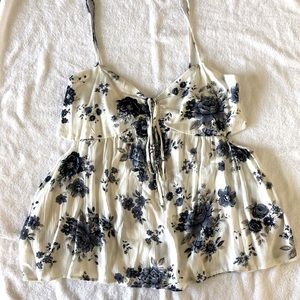 White with blue floral camisole with side cutouts